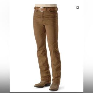 WRANGLER MEN'S SLIM FIT  COWBOY
CUT JEANS. $100 dollar original price